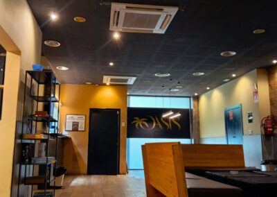 Main lounge area of Kaiju Cannabis Association in Barcelona